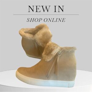 Woman’s faux suede tan booties